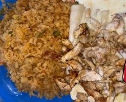 Enchiladas Tipicas topped with grilled chicken